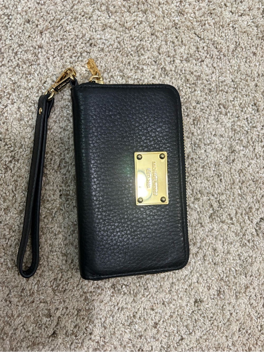 Michael Kors Black Pebbled Leather Wristlet with Gold Plate
